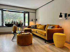 Gezellig chalet met 2 slaapkamers aan bosrand
